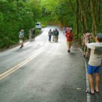 a group of people walking down the street