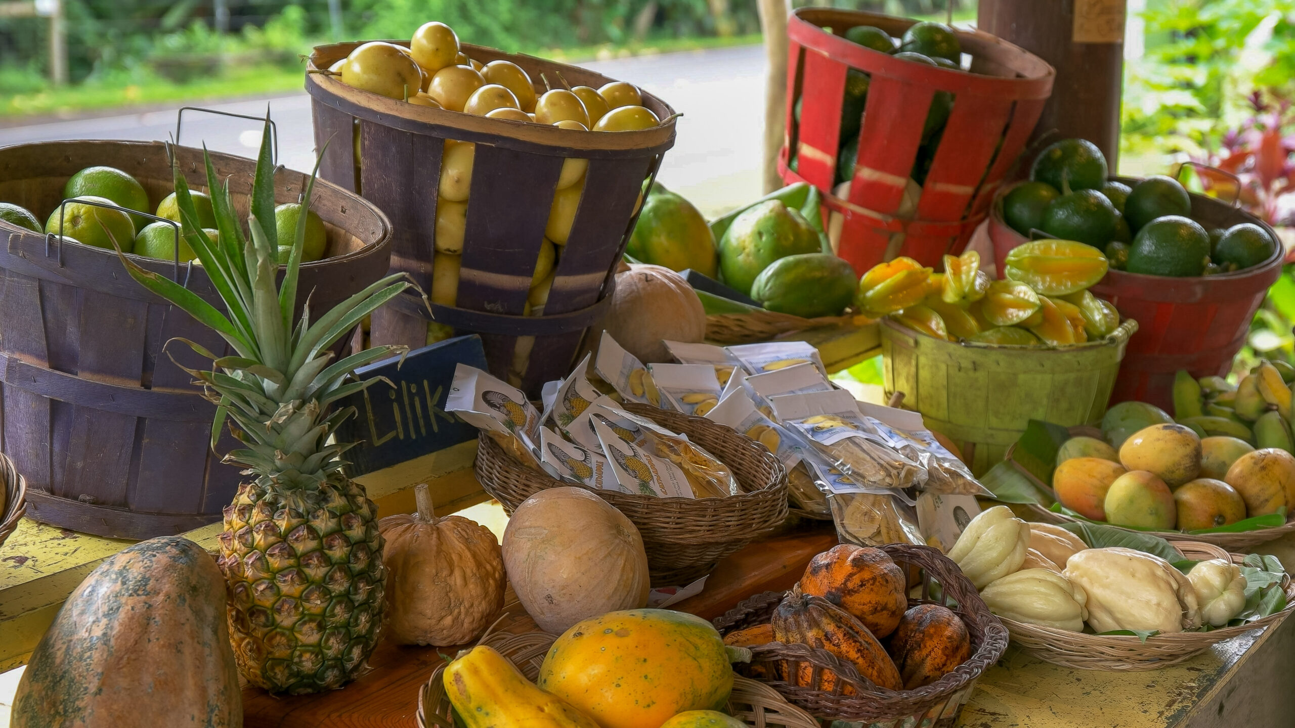 a group of fruit and vegetables on display