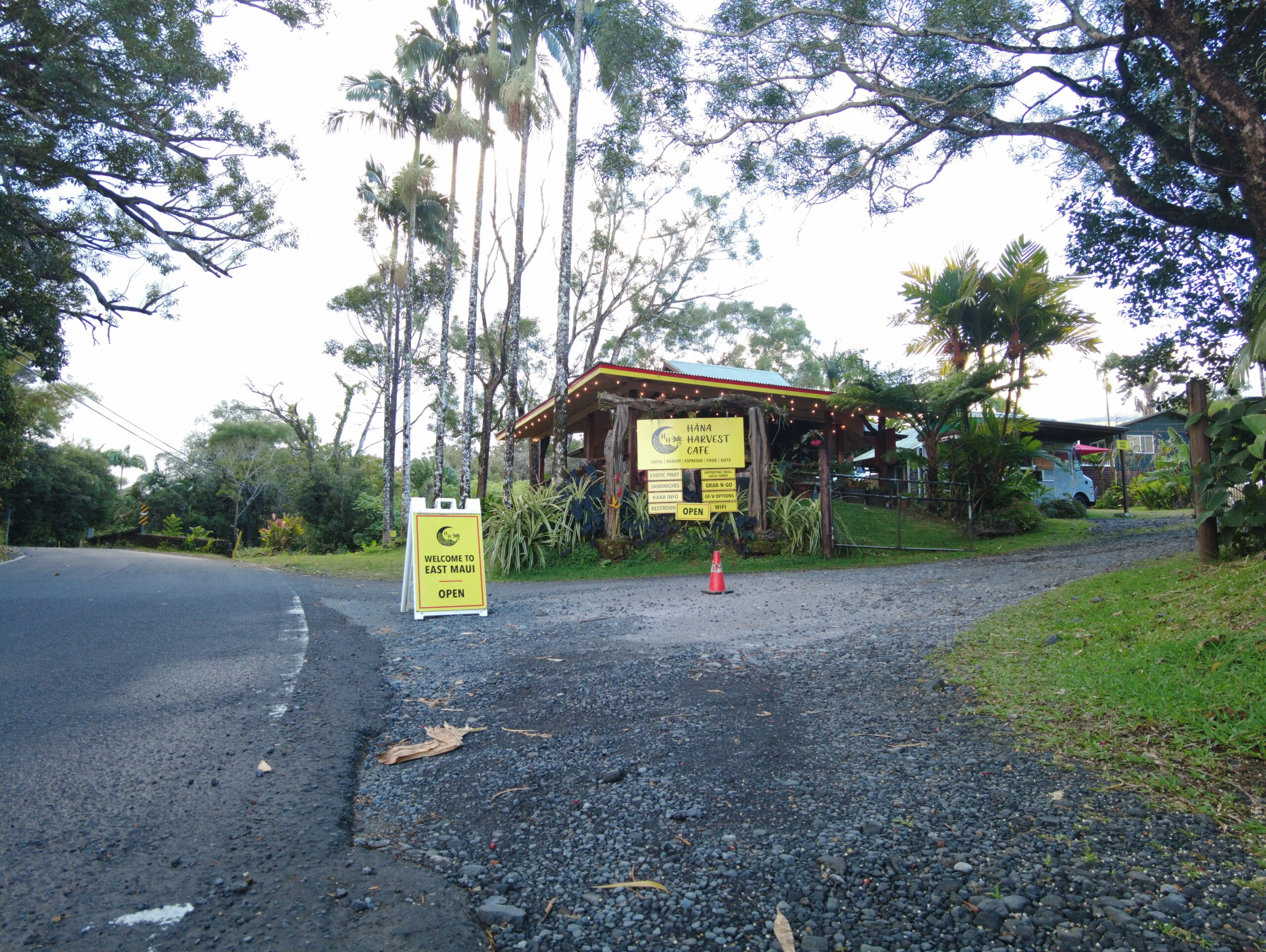 signs at the entrance of the Hana Harvest Cafe
